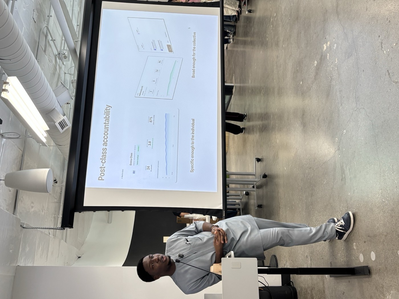 David presenting the post-class accountability screens at GradEx