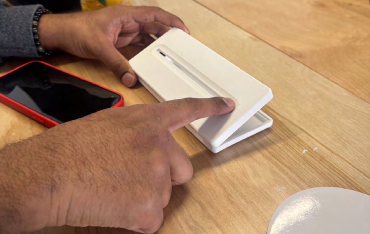 A 3D-printed mid-fidelity prototype being tested by hand